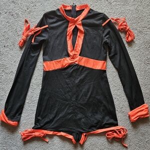 Black/orange sexy ninja Halloween costume. Medium. New without tags.